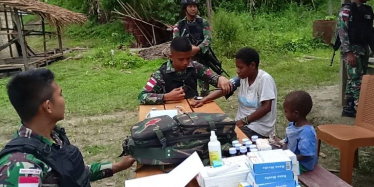 Patriot di Perbatasan Papua, Pamtas Satgas Yonif 126/KC Berikan Pelayanan Kesehatan Gratis Secara Masif