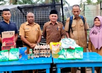Bupati Labuhanbatu Diwakili PLT Kadis Sosial Serahkan Bantuan Di Panai Hilir